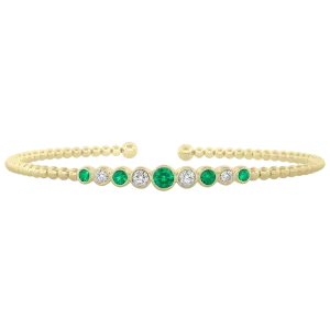 0.26CT DIAMOND 0.33CT EMERALD BANGLE