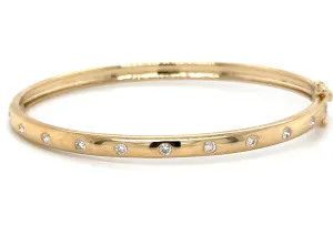 0.44ct tw Burnish Set Diamond Station Bangle Bracelet