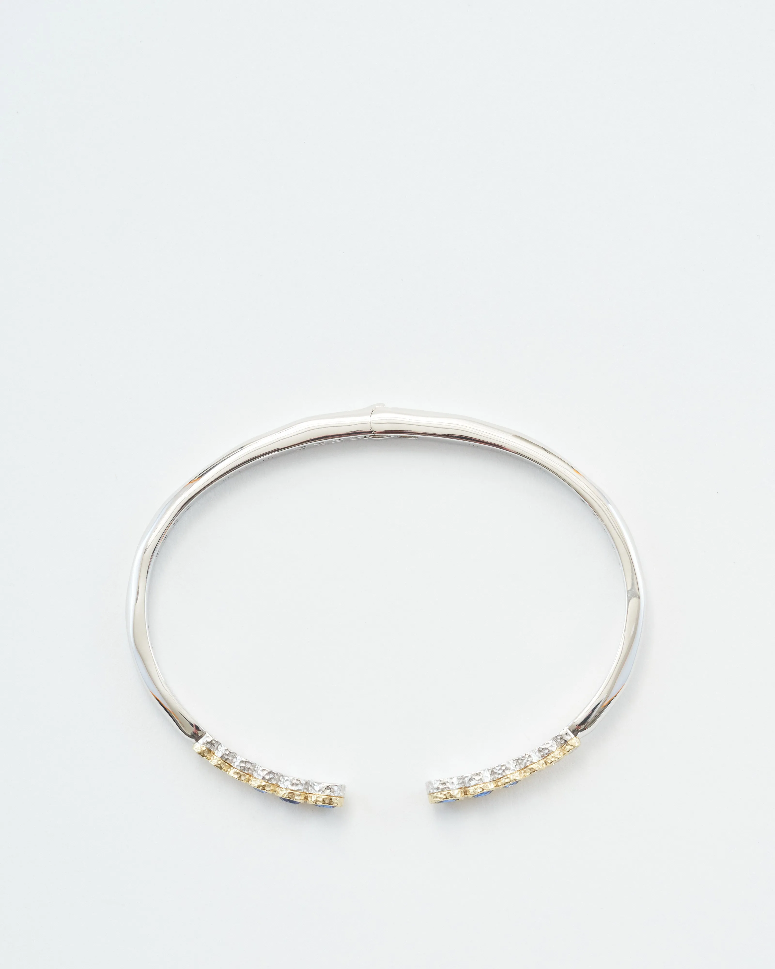 classic two-toned open bezel set sapphire bangle