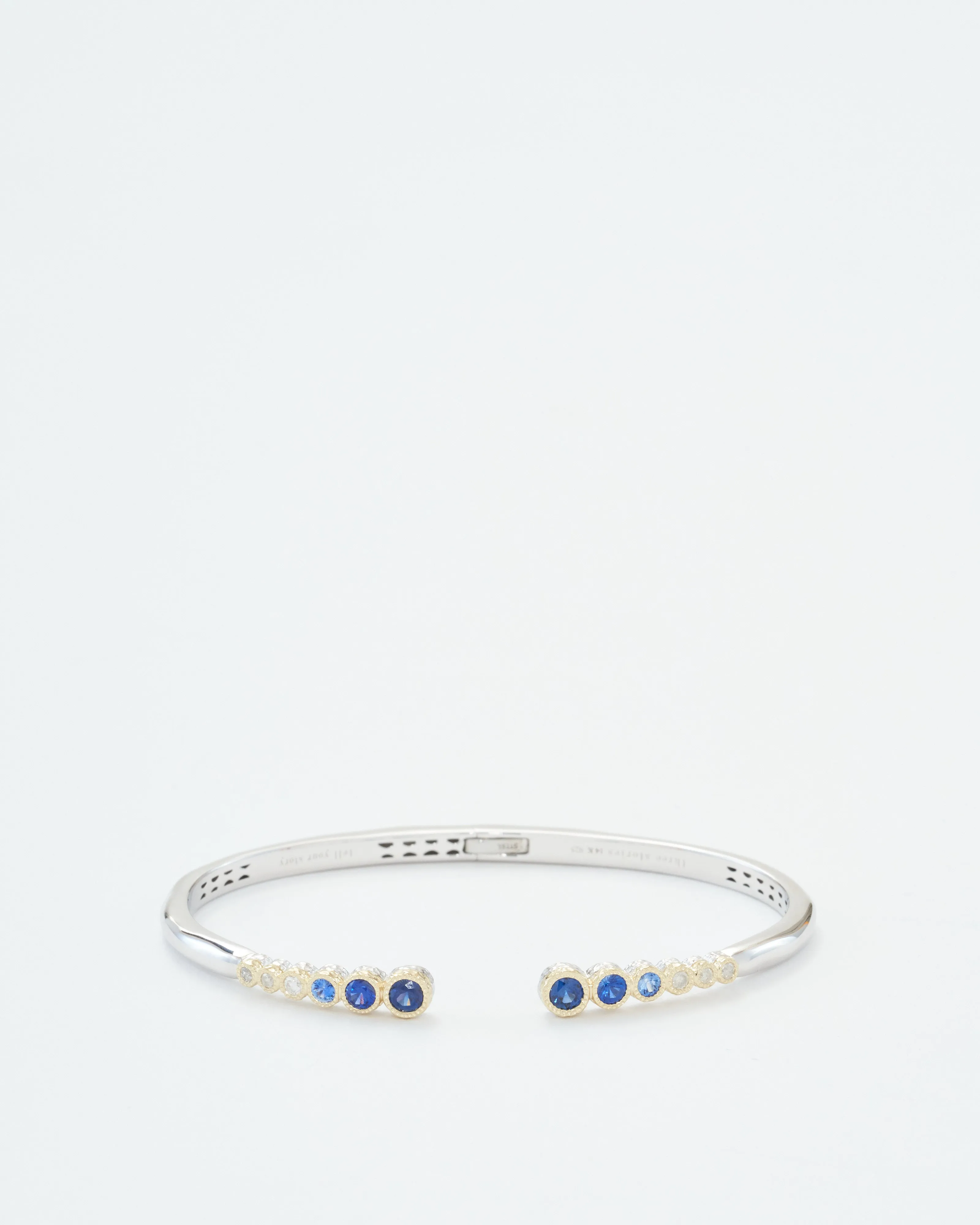 classic two-toned open bezel set sapphire bangle
