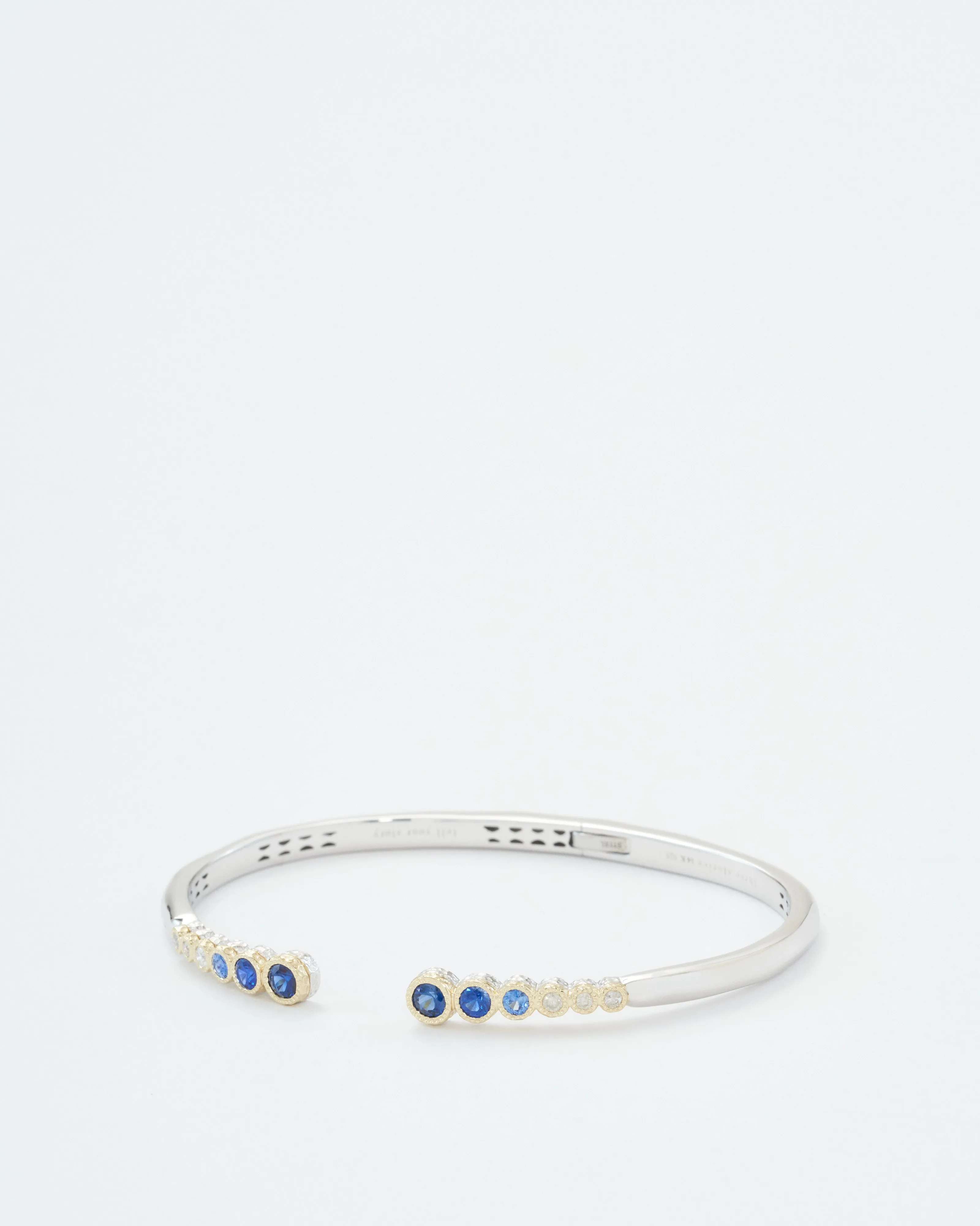 classic two-toned open bezel set sapphire bangle
