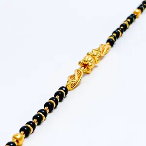 Elongated Barrel 22k Gold Black Bead Baby Bracelet