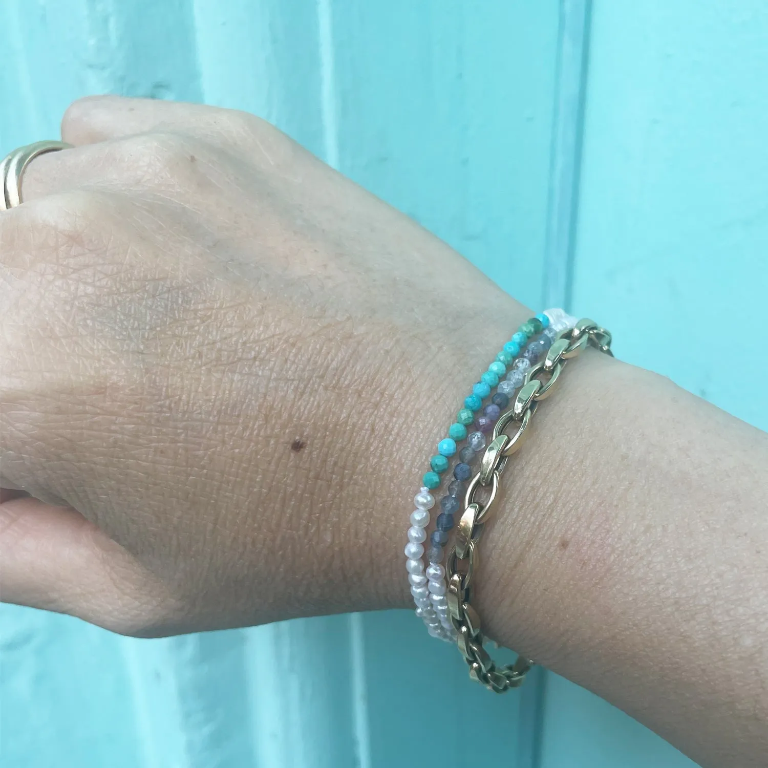 Flamenco Seedpearl bracelet with color blocked multi-color Sapphire and Ruby