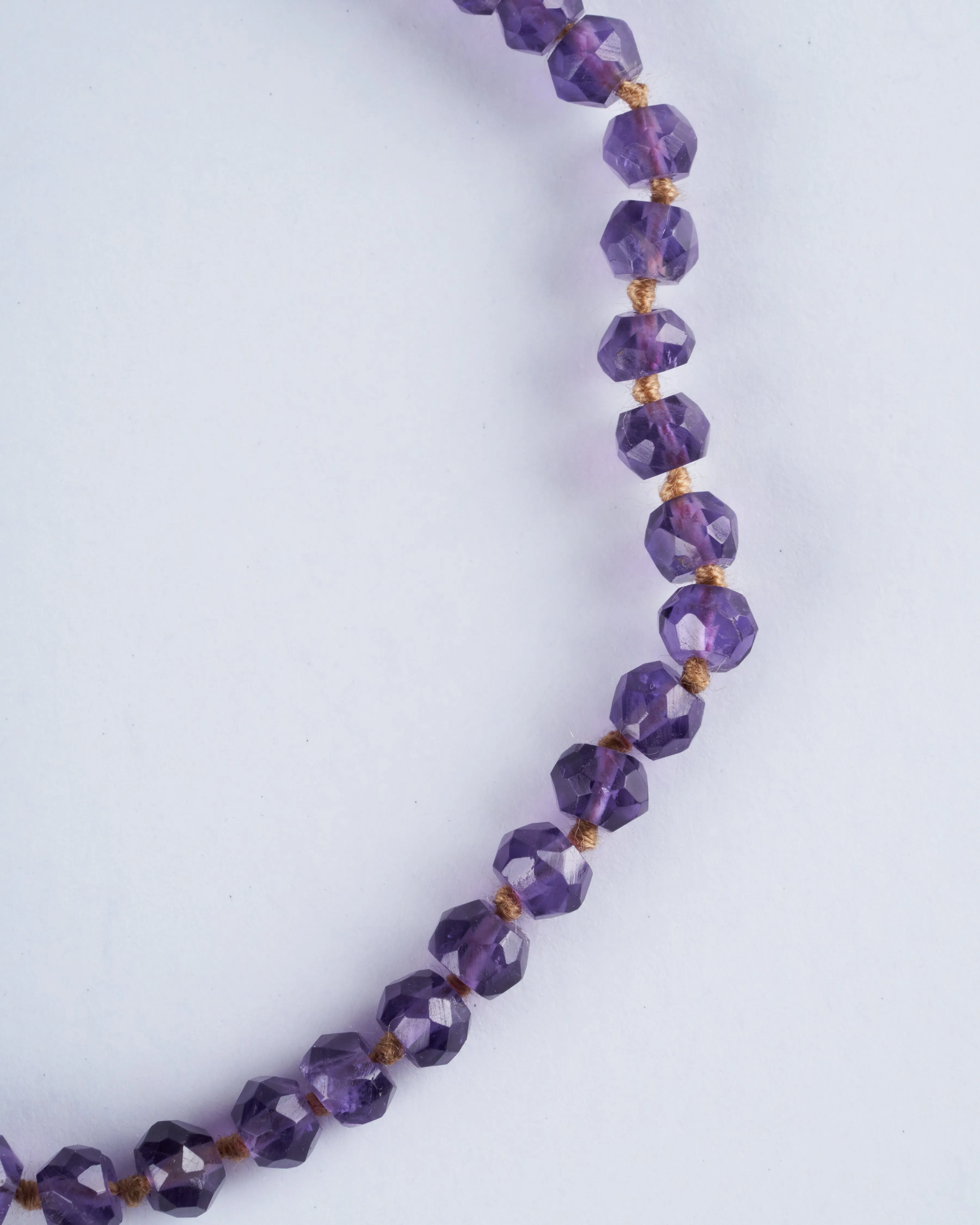 knotted amethyst with button