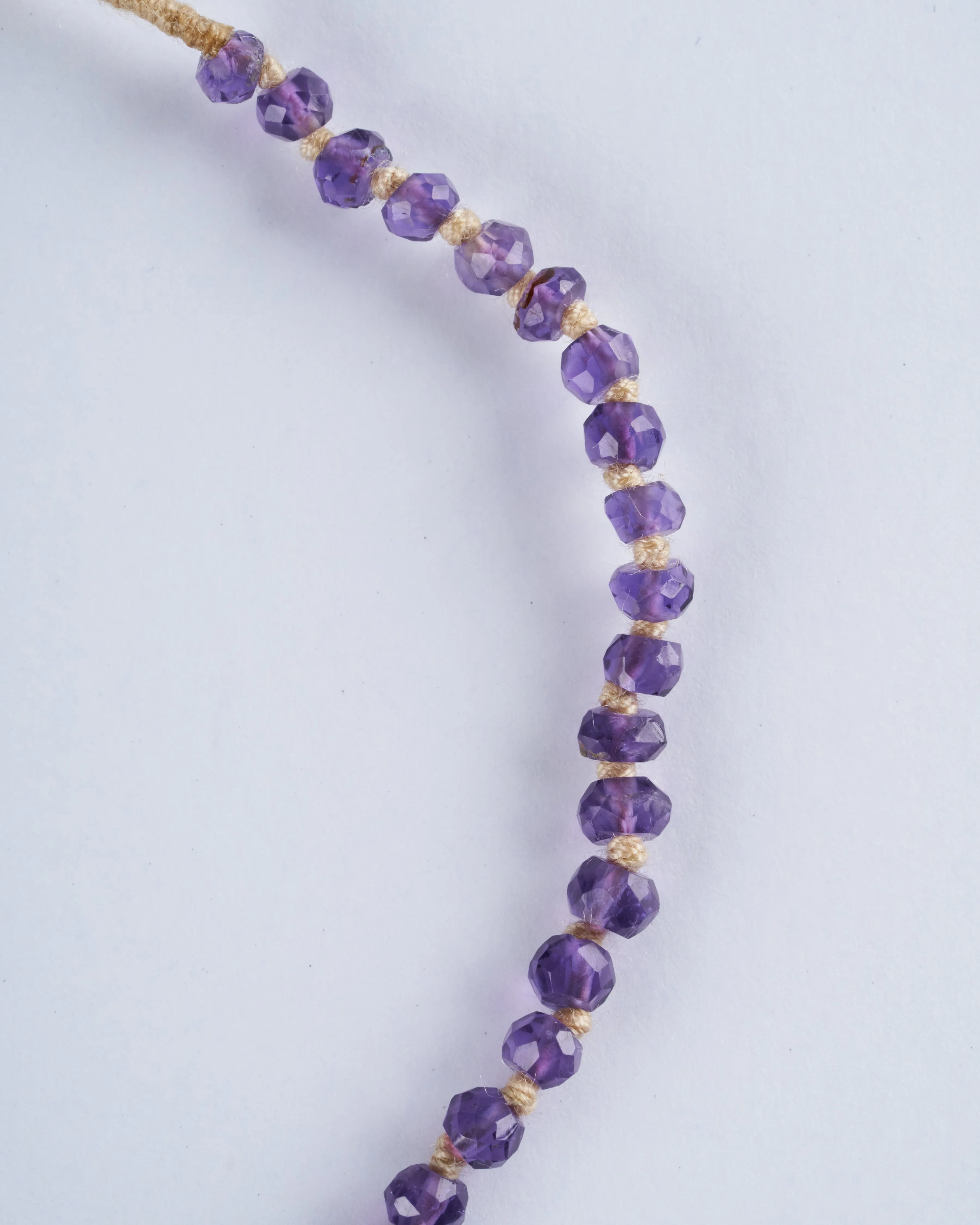 knotted amethyst with button