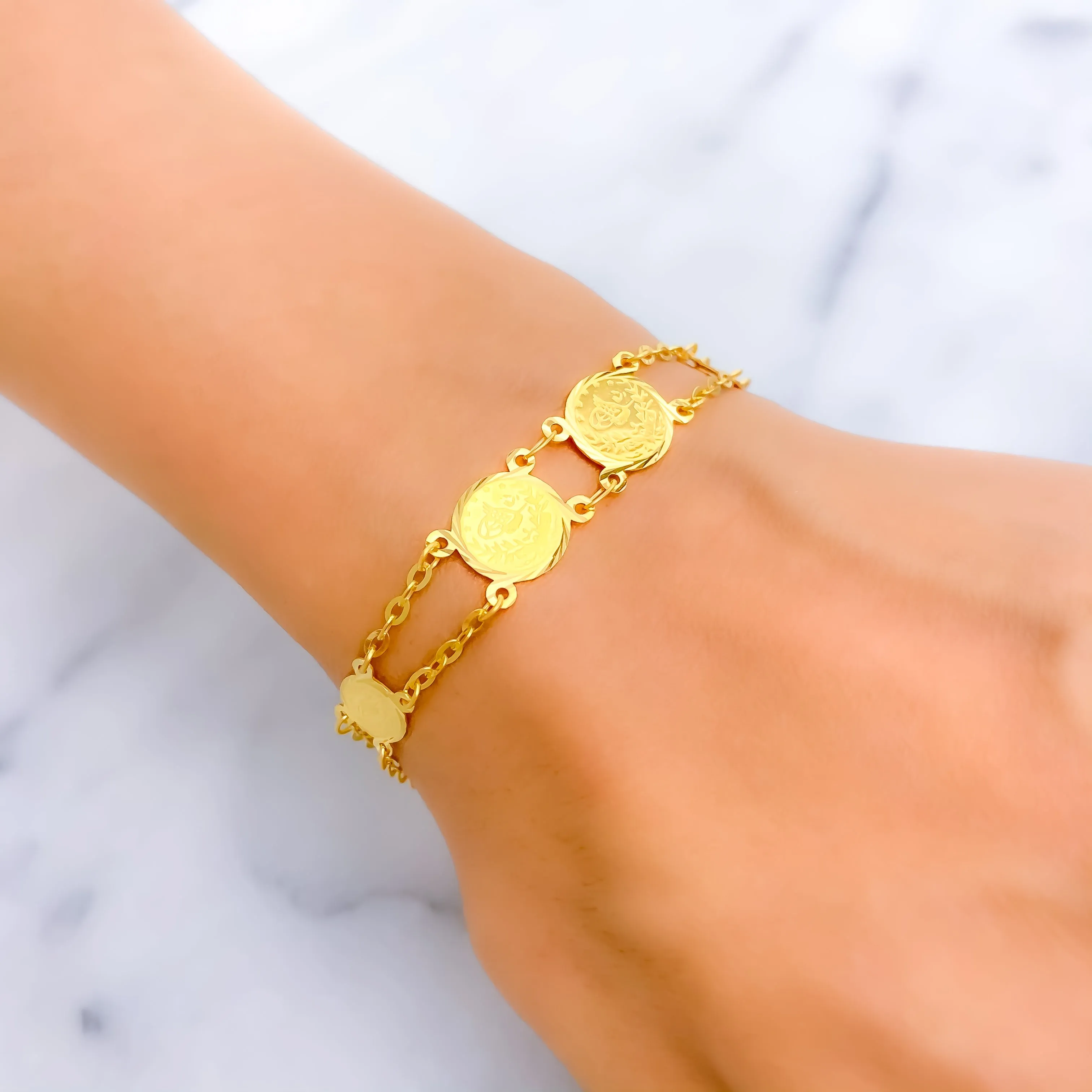 Radiant Graceful 21k Gold Coin Bracelet