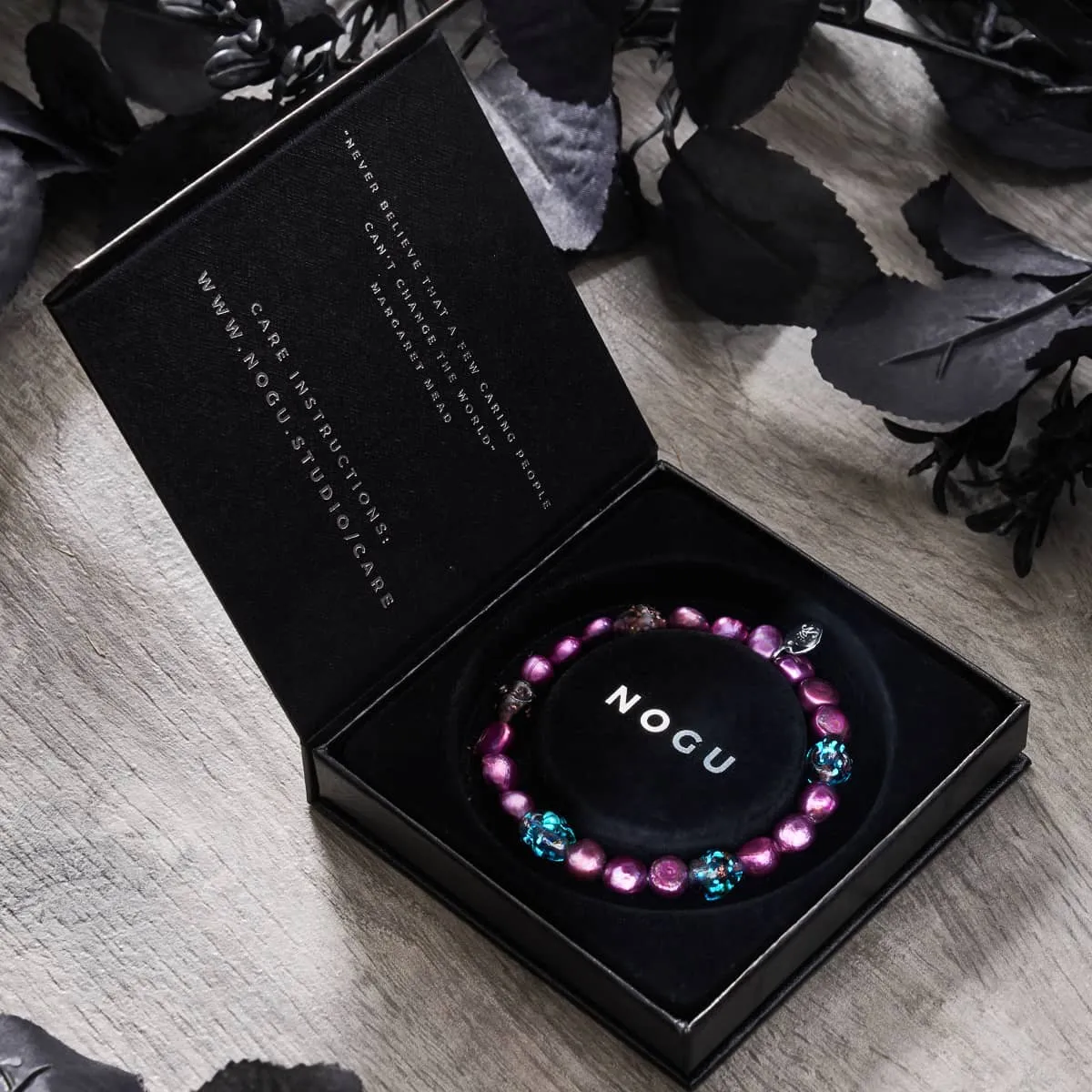 Violet Shadows | .925 Sterling Silver | Purple Freshwater Pearl x Firefly Glass Skull Bracelet